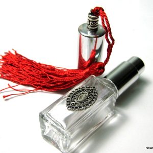 Flacon de parfum original en verre pompon rouge