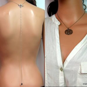 Collier de dos métal argenté filigrané