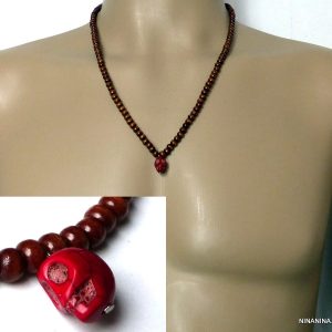 Collier ethnique tête de mort rouge et perles bois