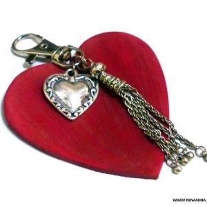 Bijou de sac – porte clé en cuir rouge personnalisé