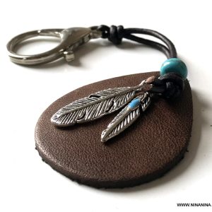 Porte clé en cuir personnalisable pendentif plume