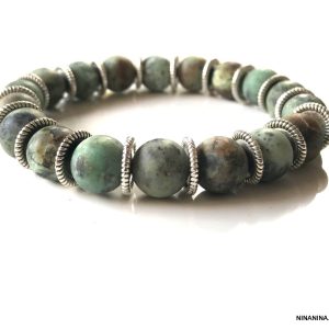 Bracelet boule turquoise mat pour homme sur fil elastique