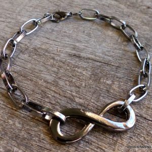 Bracelet avec infini homme chaine maillons métal noir