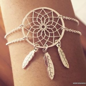 Bracelet attrape reves pour biceps métal argenté