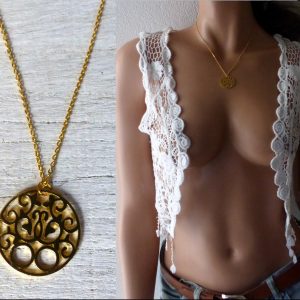 Collier karma pendentif bouddha rond acier doré