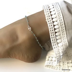 Chaine de cheville signe infini argent topaze bleue