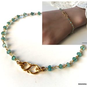 Bracelet Topaze bleue signe infini Plaqué Or