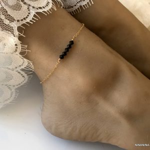 Bracelet de cheville Swarovski plaqué or et perles noires